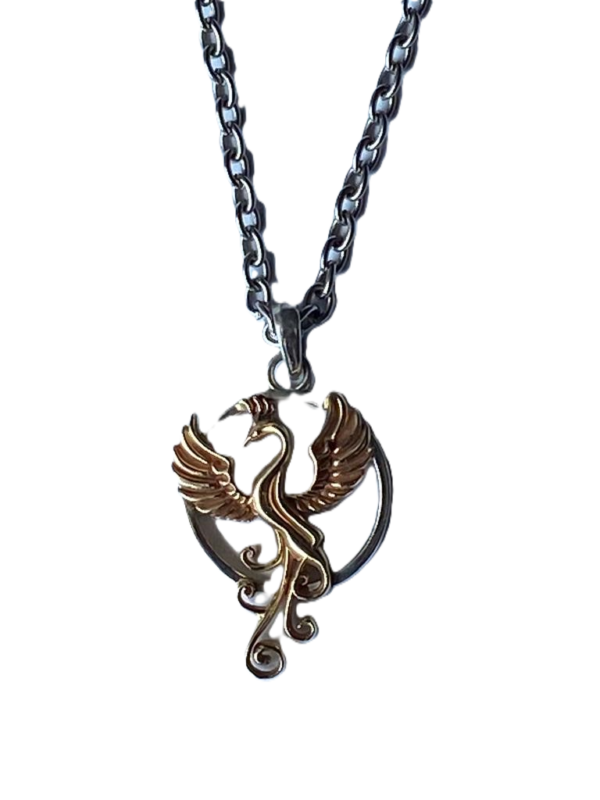 Rise from the ashes and embrace renewal with the Ascendancy Phoenix Pendant. This exquisite piece, crafted from gleaming 18Kt yellow and white gold, depicts a majestic phoenix in mid-flight. The warm yellow gold captures the fiery essence of the mythical bird, while the cool white gold accentuates its powerful wings.