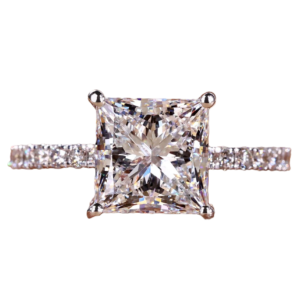 A princess cut diamond is a popular diamond shape known for its modern and elegant look. It has a square or rectangular outline when viewed from the top, with sharp corners that give it a distinct geometric appearance.